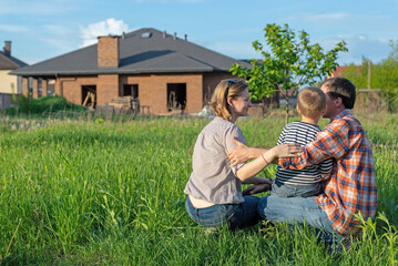 couple looking on house