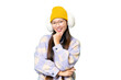 © luismolinero - Young Asian woman wearing winter muffs over isolated chroma key background with glasses and smiling