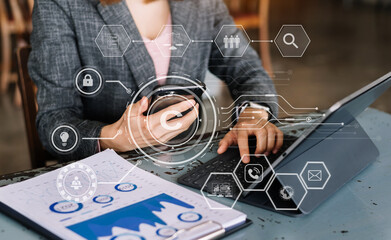 Wall Mural - Copyright or patent concept, Person hand using laptop computer, tablet and smartphone with virtual screen copyright icon trademark, Creation ownership against piracy. at office.