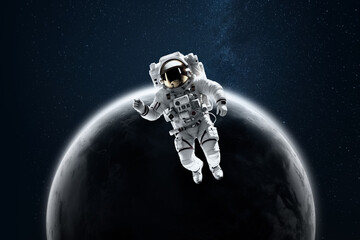 Wall Mural - Astronaut in a white spacesuit in space on the background of the moon. Exploring space and other planets, colonizing the solar system. Copy space, 3D illustration, 3D renderer.