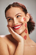 © K. A./peopleimages.com - Face, lipstick kiss and beauty woman or makeup model in studio for cosmetics, love and happiness. Headshot of aesthetic person thinking or dream of valentines day facial idea or skincare motivation