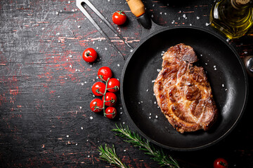 Sticker - Frying pan with grilled steak. 