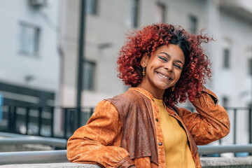 Canvas Print - latin girl with afro hair on the street outdoors