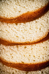 Poster - Pieces of wheat bread. Macro background. 