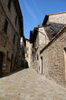 Old narrow alley in Assisi, Umbria Italy