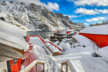 Wall Mural - Stunning morning seascape of Norwegian sea and cityscape of Nusfjord village.