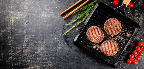 Sticker - Grilled burger in a frying pan. 