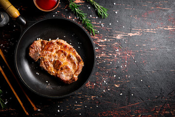 Canvas Print - Frying pan with grilled steak. 