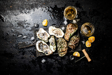 Sticker - Raw oysters with ice on an cutting board. 