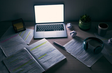 Poster - Laptop, mockup and desk for studying at night in student dormitory, dark room and technology. Background of computer, blank screen and notes on table in evening for education, learning and internet