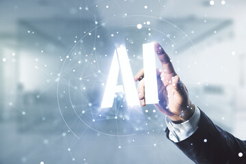 Aufkleber - Man hand working with abstract virtual artificial Intelligence symbol hologram on blurred office background. Multiexposure