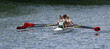 Ladies Fours Sculling Team Rowing on River.
