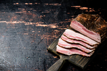 Sticker - Pork lard cut on a cutting board. 