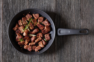 Wall Mural - seared juicy new york strip steak bites