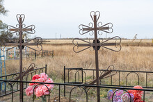Grave With Old Metal Crosses