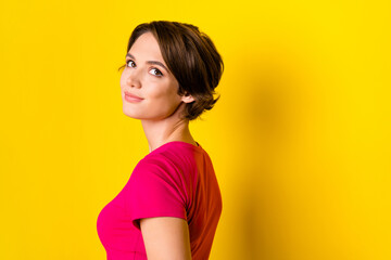 Profile side photo of lovely lady look empty space announcement low prices clothes isolated on yellow color background