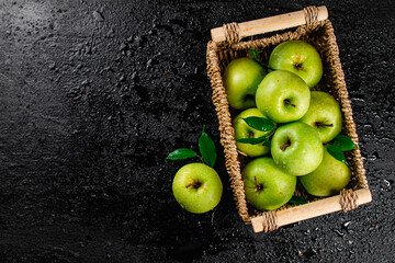 Sticker - Fresh green apples in a basket. 