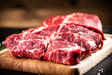 Sticker - Chopped raw beef on a cutting board. 