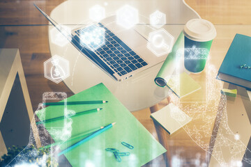 Poster - Computer on desktop in office with technology theme hologram. Double exposure. Tech concept.