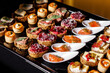 © 9parusnikov - Various snacks at the buffet.