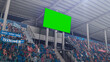 © Gorodenkoff - Stadium Championship Match: Scoreboard Green Chroma Key Screen. Crowd of Fans Cheering, Having Fun. Sports Channel Television Advertising Mock-Up. Content for Digital Devices Display Concept.