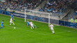 Football Championship Stadium with Crowd of Fans: Soccer Football Match Championship: Blue Team Players with Black Forward Leading Attack, Scores Goal. Sport Channel Broadcast TV Concept.