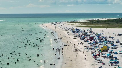 Canvas Print - Aerial seascape with Siesta Key sandy beach in Sarasota, USA. Many tourists enjoing summer vacation time swimming in warm Mexico gulf water and sunbathing on hot Florida sun