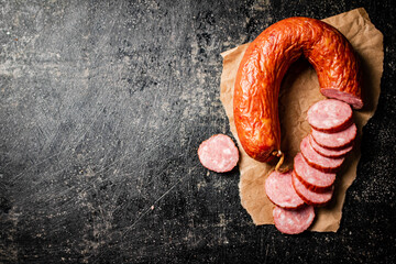 Wall Mural - Cut into round pieces of salami sausage. 