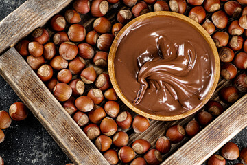 Canvas Print - Hazelnut butter on a wooden tray. 