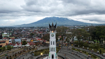 Wall Mural - Aerial view of Jam Gadang, a historical and most famous landmark in BukitTinggi City, an icon of the city and the most visited tourist destination by tourists.