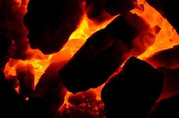 Poster - Huge chunks of anthracite charcoal slowly flare up.