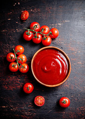 Canvas Print - Tomato sauce in a wooden plate. 