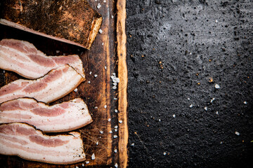 Poster - Pieces of lard on a cutting board. 