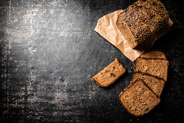 Poster - Sliced rye bread on paper. 