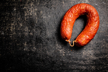 Canvas Print - Delicious salami sausage on the table.