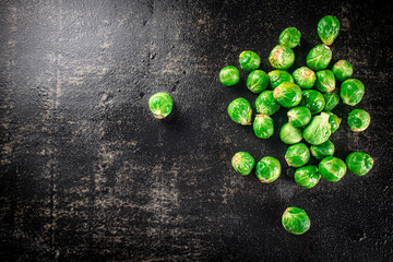 Canvas Print - A pile of Brussels cabbage on the table. 