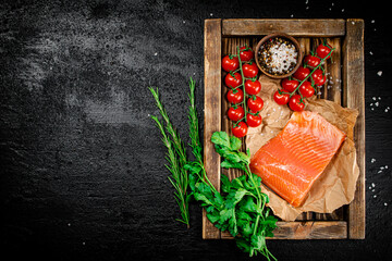 Poster - Salted salmon with parsley and tomatoes on a wooden tray. 