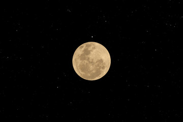 Wall Mural - full moon with many stars in the sky.