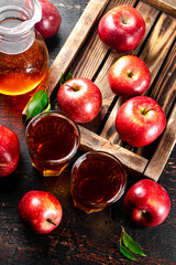 Poster - A glass of apple juice on the table. 