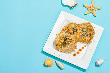 Wall Mural - Hake fillet fried in batter. Sauce, fresh rosemary. Vegetarian healthy food concept