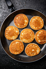 Sticker - Homemade pancakes in a frying pan. 