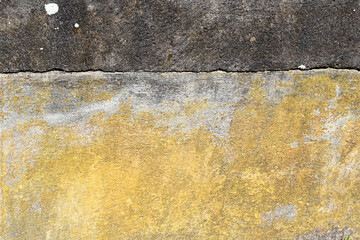 Canvas Print - Yellow and black stained concrete wall background and wallpaper texture