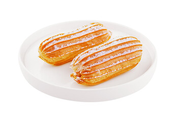 two eclairs on white plate isolated