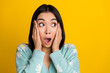 Closeup face photo of surprised japanese girl wear blue stylish pullover touch cheeks open mouth breaking news isolated on yellow color background