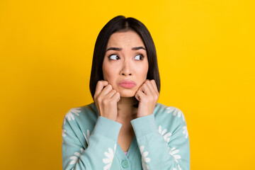 Poster - Photo of upset lonely lady wear stylish clothes hands cheeks look empty space lost job bad mood isolated on yellow color background