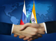 Two person shaking hands in front Indian,Russian flags.India,Russia bilateral relation concept background