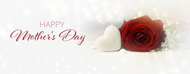 Wall Mural - Mother's Day greeting card with red rose and heart against white bokeh lights - background banner, panorama