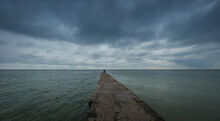 Otrada Beach In Odessa, Ukraine, In A Gloomy Summer Morning. Dark Clouds Asperatus Over The Sea Until Dawn.