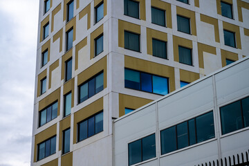 Wall Mural - Office high rise with white and green exterior.