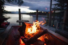 Campfire On Lakeshore At Evening